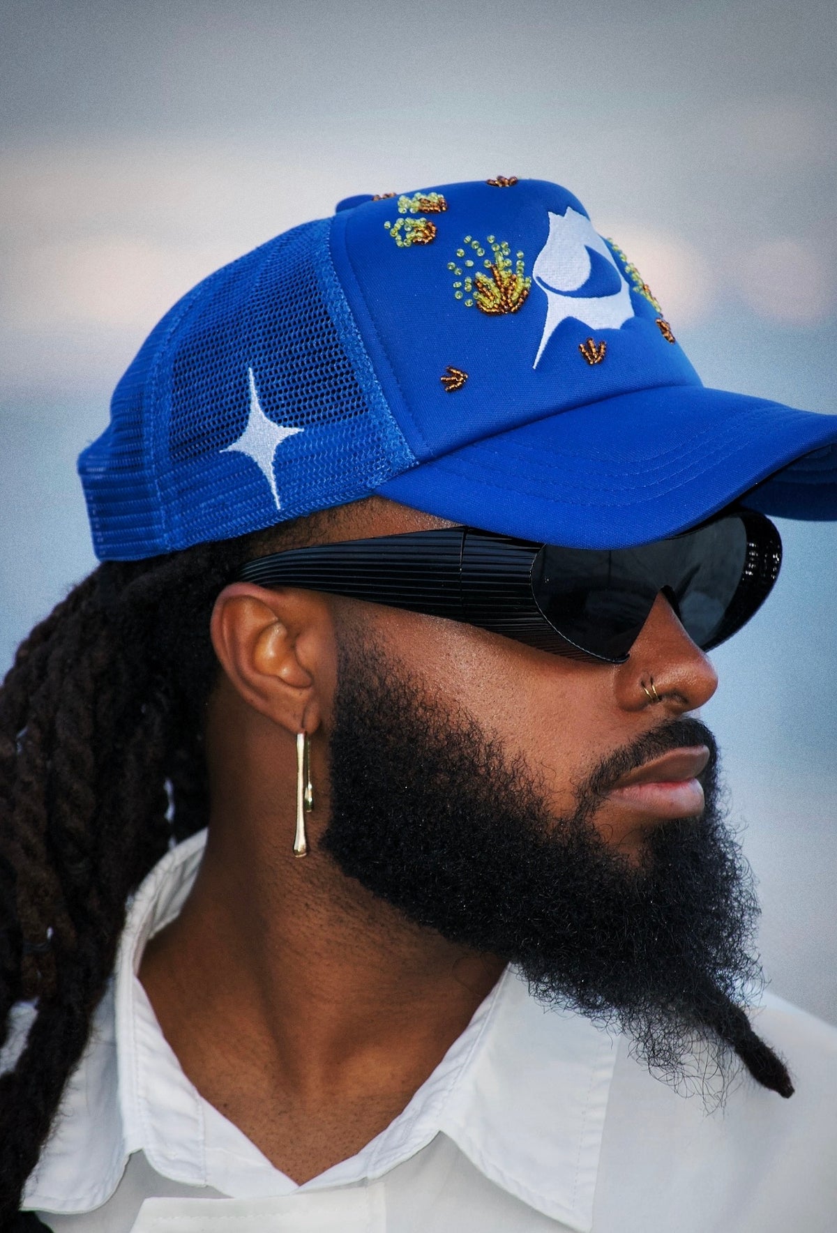 Casquette perlée bleu